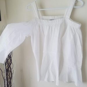 White flowy off the shoulder shirt